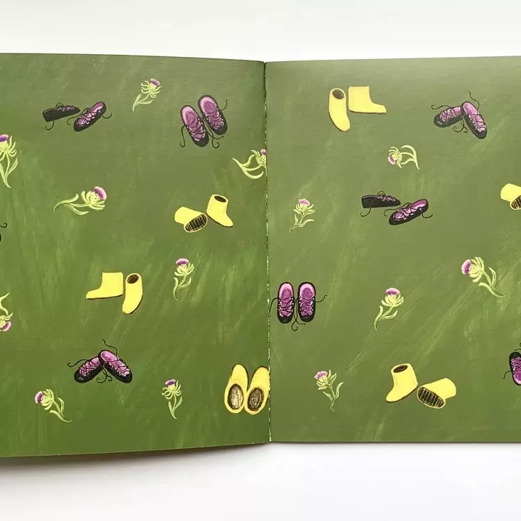 end papers for the highland Cowgirl showtime, featuring yellow illustrated wellies, purple thistles and black dancing shoes, all illustrated and set on a green background.